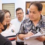 Governor Dennis “Delta” Pineda distributes medical assistance